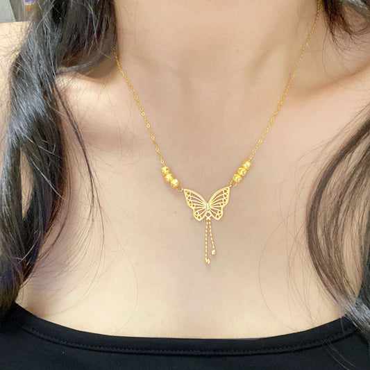 Golden Cut-Out Butterfly Necklace with Tassels