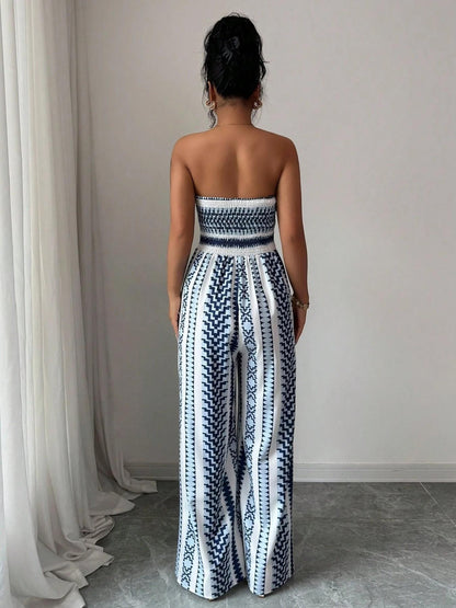 🌀 LIMITED-TIME 50% OFF! 💥 Geometric Jumpsuit with Halter Neckline & Side Slit – Unique Print, Elegant Fit, Versatile Style ✨