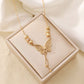 Golden Cut-Out Butterfly Necklace with Tassels