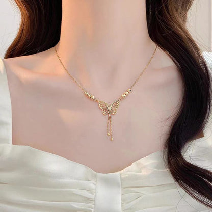 Golden Cut-Out Butterfly Necklace with Tassels