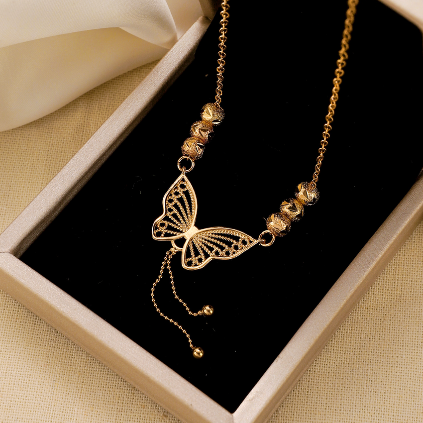 Golden Cut-Out Butterfly Necklace with Tassels