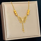 Golden Cut-Out Butterfly Necklace with Tassels